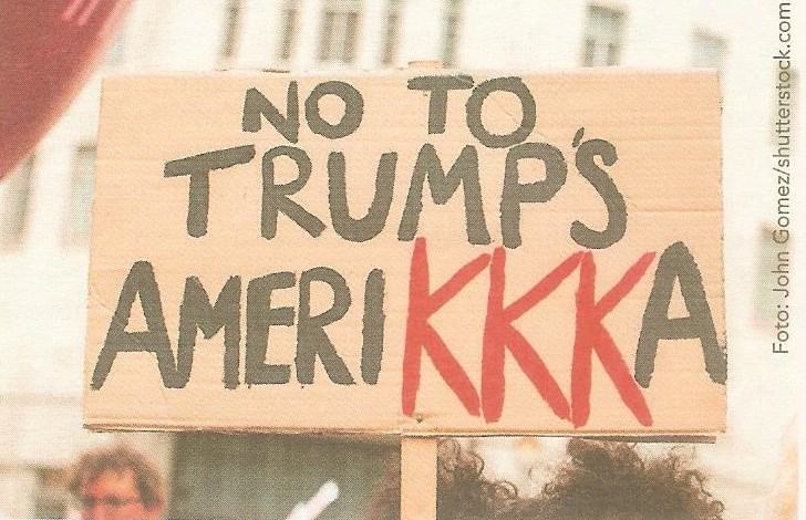 Пплакат-протест против расистской политики Трампа с проекцией на Ку-Клукс-Клан (ККК)
